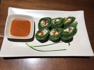 Mustard green roll with gấc sauce  at Hum Vegetarian - District 1 in Ho Chi Minh City