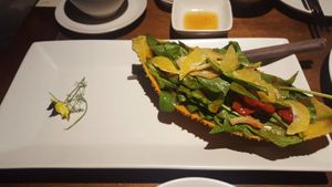 Gac salad https://en.wikipedia.org/wiki/Gac at Hum Vegetarian - District 1 in Ho Chi Minh City