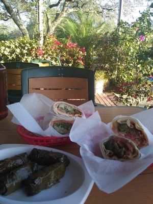 outdoor seating + food at Bread and Butter Deli in Tarpon Springs