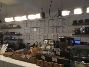 Till point with menu options behind at Wild & The Moon - rue Charlot in Paris