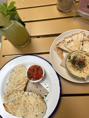 Traditional hunmus & tomato toast and the detox water (so good!)  at Almalibre Acai Bar in Valencia