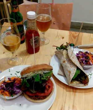 Vegan red rice and tempeh burger with sojanese & vegan hummus wrap with grilled veggies at Almalibre Acai Bar in Valencia