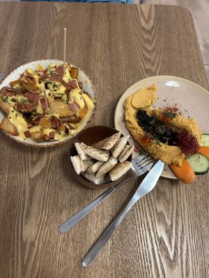 Patatas and hummus   at Almalibre Acai Bar in Valencia