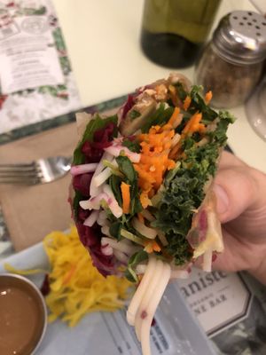 Biting into the Summer Roll at Le Botaniste - UES in New York City