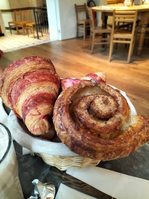 Croissant hibiscus + Cinnamon Roll at Le Pain Quotidien in Brussels