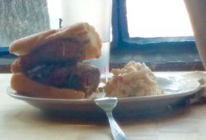 Fried mozzarella & meatball with a side of bacon macaroni salad at The Butcher's Son in Berkeley