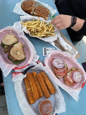Killer BLAT, garlic fries, mozzarella sticks, chicken Parm, avocado on toast  at The Butcher's Son in Berkeley