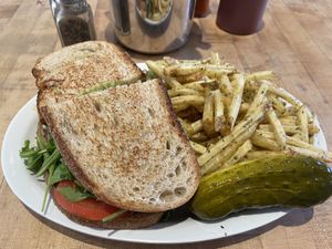 Hot chicken pesto with garlic fries   at The Butcher's Son in Berkeley