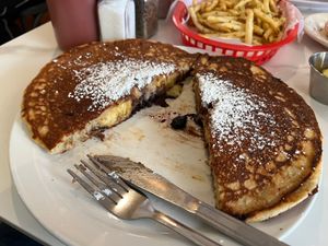 Blueberry pancake with chocolate glazed donut center at The Butcher's Son in Berkeley