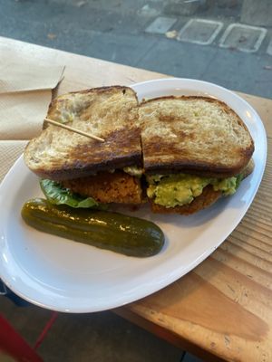 Killer BLAT: sourdough w/ fried chicken, mayo, lettuce, tomato, bacon, jalapeños (removed) & smashed avocado 😋 Would totally order again, minus I don’t do spicyy  at The Butcher's Son in Berkeley
