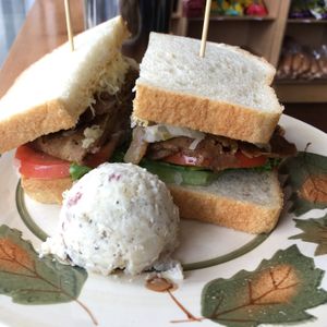 Hot roast beef sandwich with side of potato salad ($12.95 + tax & tip) at The Butcher's Son in Berkeley