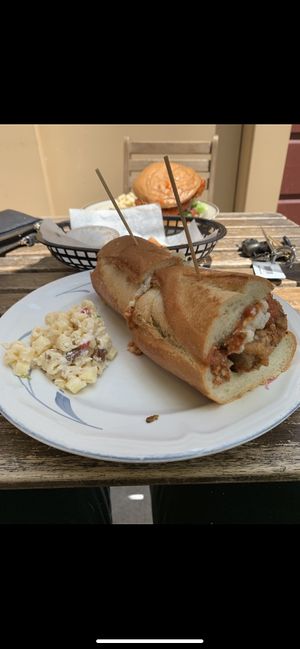 chicken parm and buffalo bacon chicken burger!! so good  at The Butcher's Son in Berkeley