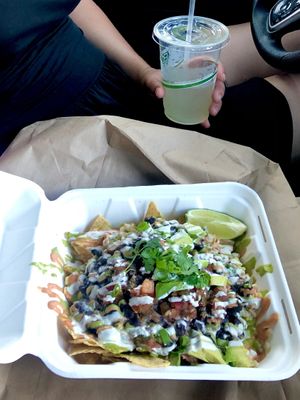 OOOOH MY GOODNESS, THEIR NACHOS!!!!  at OM Foods in Chico