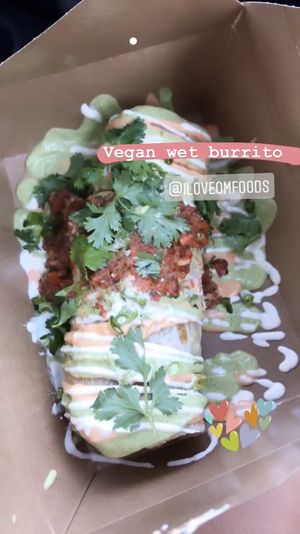 Their new menu with the vegan wet burrito  at OM Foods in Chico