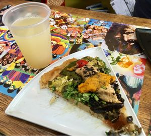 Faina with sunflower seed pate and a licuado - daily special for ARS35 at Y la vaca Chocha in Buenos Aires