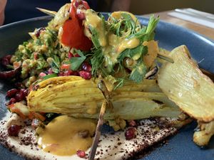 grilled chick’n*, pepper & fennel, preserved lemon marinade, jewelled pomegranate & cranberry farro, soft herbs, whipped tahini at Mildreds - Kings Cross in North London