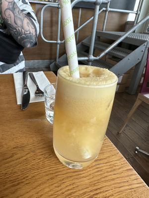 Pineapple, apple, turmeric and ginger juice  at Mildreds - Kings Cross in North London