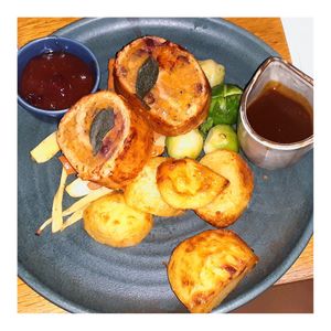 Roast "turkey" roulade with butternut chesnut stuffing, Roasted Carrots & Daikon, Cranberry Apple Relish, Brussel Sprouts, and Gravy at Mildreds - Kings Cross in North London