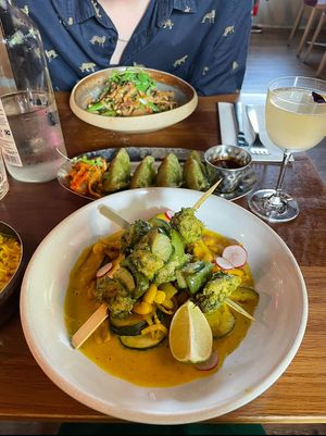Shiitake Tempeh Dan Dan Noodles And Mojo Verde Chick n Skewers with Kim Chi Gyoza.  at Mildreds - Kings Cross in North London