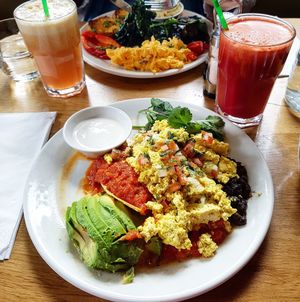 Tostada - corn tortilla with organic black beans, fried organic egg or scrambled organic tofu, with cheese and avocado (this is the vegan version) at Mildreds - Kings Cross in North London