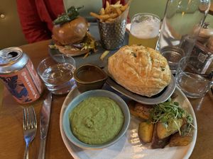 Mushroom pie with mushy peas, burger and fries.  at Mildreds - Kings Cross in North London