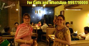 International waitresses welcome you with pleasure! at Ammaji's Ayurvedic Restaurant in Vrindavan