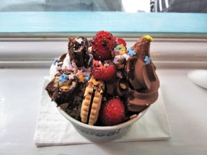 Chocolate and vanilla frozen yogurt with brownie pieces, raspberries and a Jammie Dodger at Yorica in London