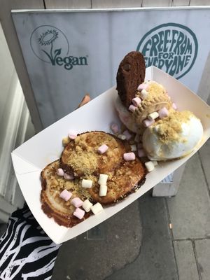 Waffles topped with marshmallows, biscuit crumbs, chocolate cookie and jammy dodger  at Yorica in London