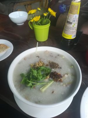 Huge bowl of tasty congee (rice porridge) with lemongrass, mushrooms and ginger.. at Am Vegetarian & Hideaway in Hoi An