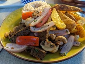 Lomo saltado de champiñones y seitan at Seitan Urban Bistro in Lima