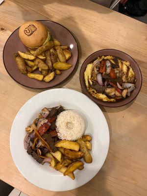 Lomo saltado, rafael y hamburguesa de garbanzos at Seitan Urban Bistro in Lima