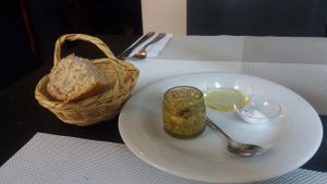 Artisan whole grain bread and olive housemaid tapenade  at Seitan Urban Bistro in Lima