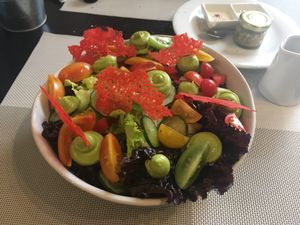 Garden salad - avocado cream, multicolored tomatoes  at Seitan Urban Bistro in Lima