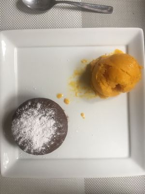 Chocolate lava cake (GREAT) with mango sorbet (meh, very frozen and not very fresh) at Seitan Urban Bistro in Lima