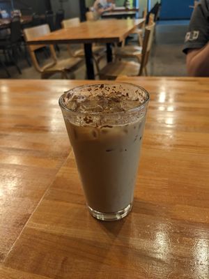 Blueberry crumble latte with oatmilk. at Kavarna Coffeehouse in Green Bay