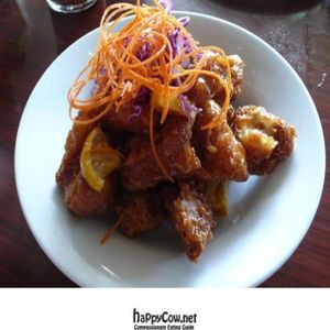 soy chicken lightly battered and marinated with orange sauce. at Vegan Plate in Studio City