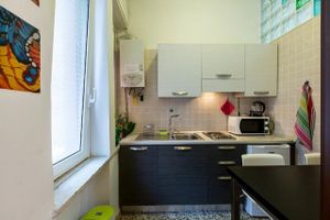 Kitchen equipped with fridge and all the needed tools to prepare your own food at any time you better prefer, 2 hot plates, microwave oven, electric kettle, crockery, pots and food staples (sugar, salt, oil, coffee, teas, spices ...)
 at Casa Veggy in Rome