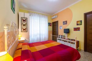 Double bed provided of all the linen and blankets and, if needed, you can host the third person in the same room in an extra single bed.  at Casa Veggy in Rome