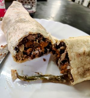 Burritos are hard to photograph at La Alpargata in Madrid