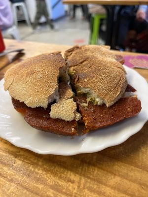 Choripán with chimichurri at La Alpargata in Madrid