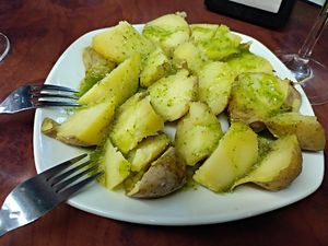 Free tapa for two: patatas con mojo at La Alpargata in Madrid
