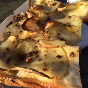 pizza with potatoe and truffle  at MADENITALY in Copenhagen