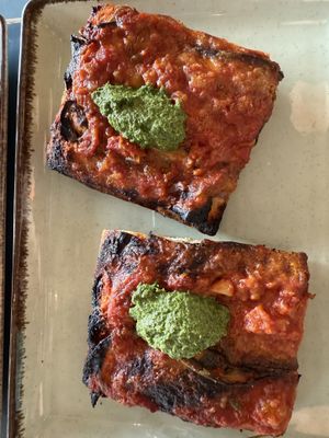 Tomatoes and pesto pizzaa  at MADENITALY in Copenhagen