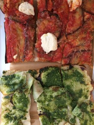 Pizza slices at MADENITALY in Copenhagen