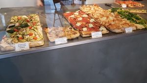 Pizza slices at MADENITALY in Copenhagen