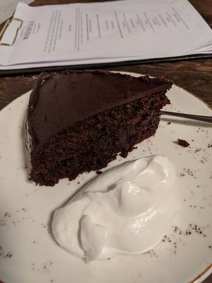 Chocolate cake with cream at MADENITALY in Copenhagen