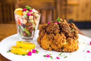 Bella & The Beast: Fried cauliflower (only cauliflower, potatoes, and falafel go in the fryer), hummus, bean salad, and golden beets. at Maro's in Oakville