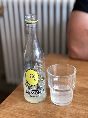 Cute bottle and tasted great, but very expensive. at Excalibur Cafe in Glastonbury