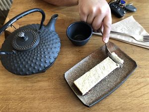 White low caffeine tea and brownie. at Excalibur Cafe in Glastonbury