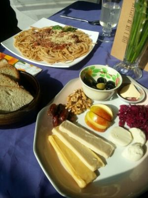 vegan cheese platter and spaghetti at Nico's Kitchen and Lounge in Hastings